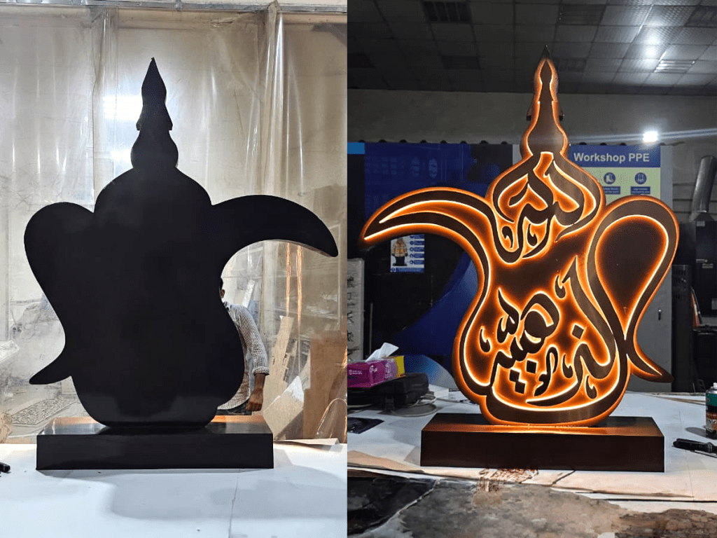 Illuminated dallah-shaped signboard with Arabic calligraphy installed by Point to Point Advertising Designs at KEZAD, Abu Dhabi